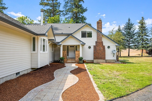 view of front of property featuring a front lawn