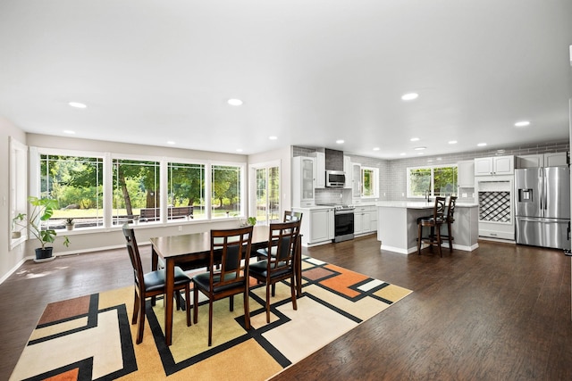 dining area featuring wood-type flooring