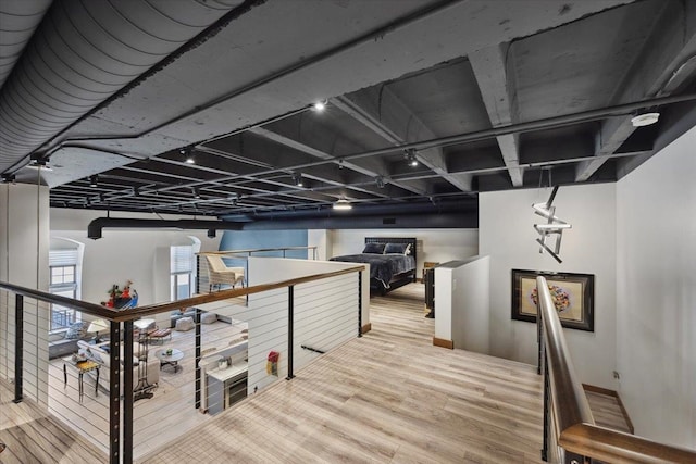 basement featuring light hardwood / wood-style floors