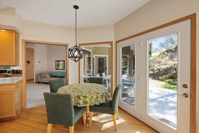 dining room featuring light wood-style floors