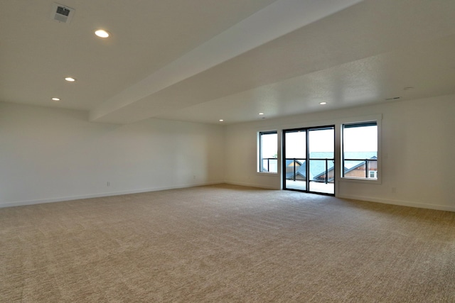 empty room featuring light colored carpet