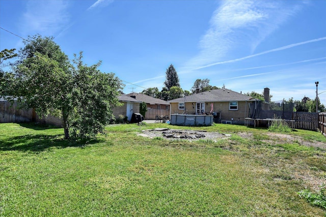 view of yard featuring a trampoline