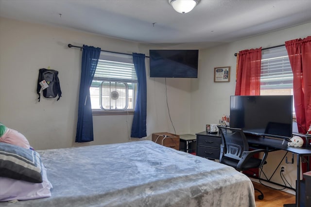 bedroom featuring wood-type flooring