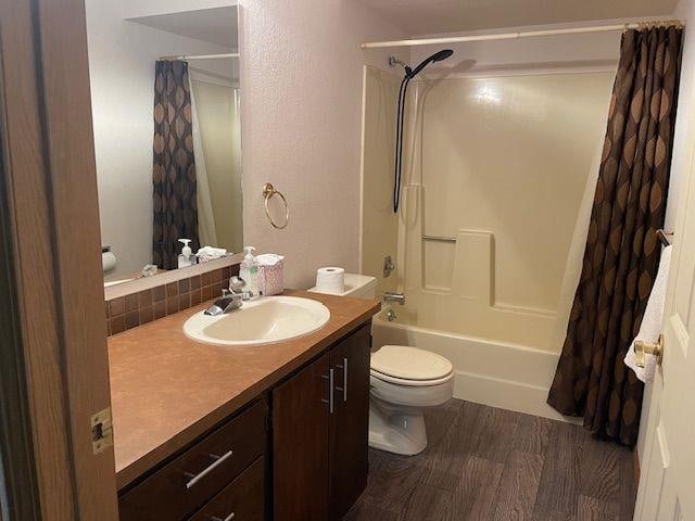 5307 N Argonne Ln # 6, Spokane, WA 99212 - full bathroom with toilet, vanity, shower / tub combo with curtain, and wood finished floors