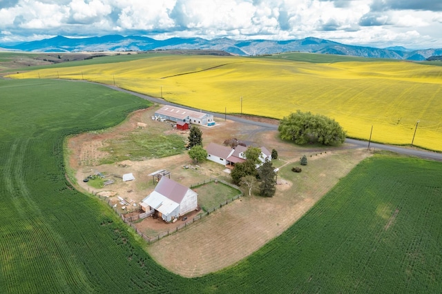 bird's eye view with a rural view and a water and mountain view