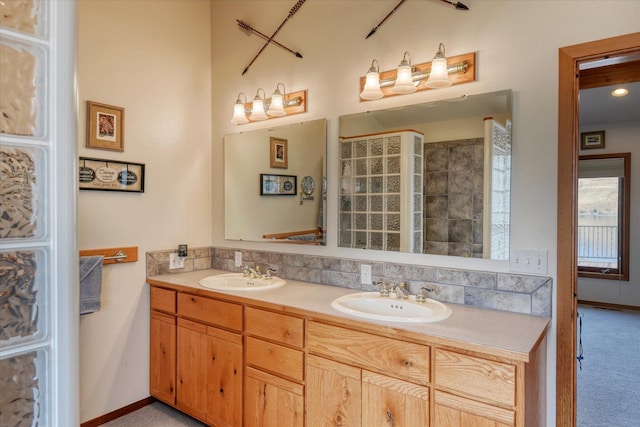 16547 E Whitelaw Rd, Wilbur, WA 99185 - full bath with double vanity, baseboards, and a sink