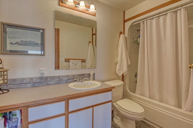 full bathroom with vanity, toilet, and shower / tub combo with curtain