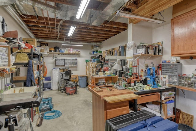 basement with a workshop area