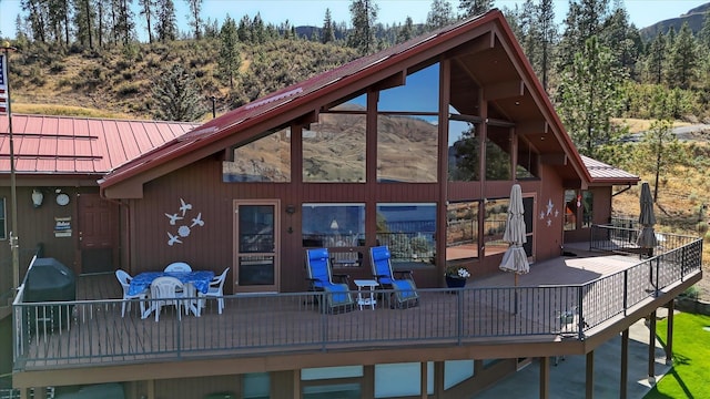 16547 E Whitelaw Rd, Wilbur, WA 99185 - back of property with a deck with mountain view and metal roof