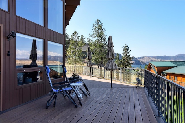 wooden terrace with a mountain view