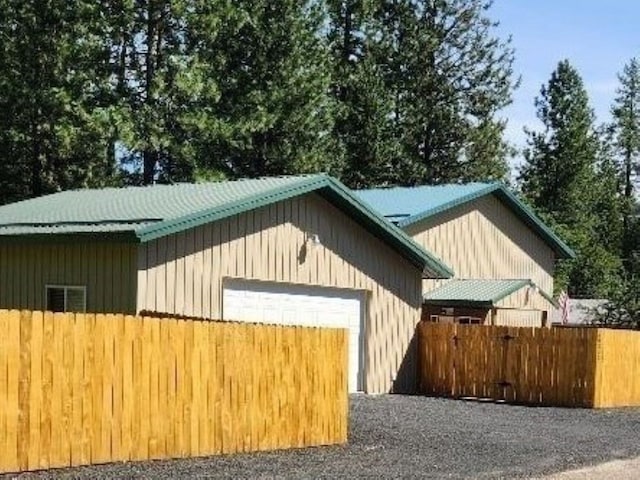 garage with fence