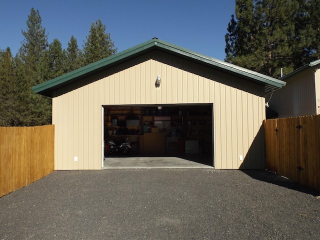 detached garage with fence
