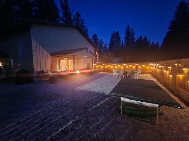 exterior space featuring a patio and an outdoor pool