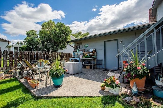 view of patio / terrace with fence