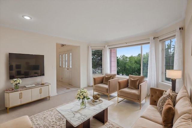 living room featuring light tile patterned floors and ornamental molding