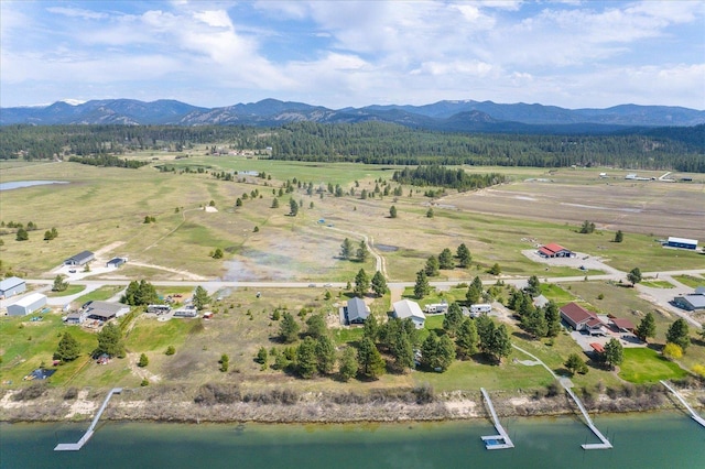 bird's eye view featuring a water and mountain view