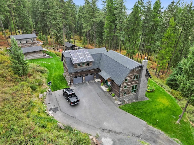 aerial view with a wooded view