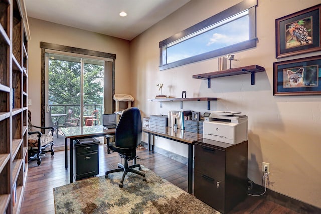 office space featuring plenty of natural light, hardwood / wood-style floors, and recessed lighting