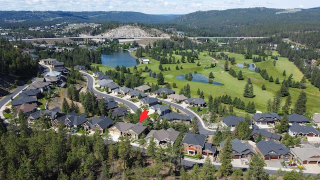 aerial view with a residential view and a water view