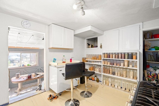 home office with a textured ceiling