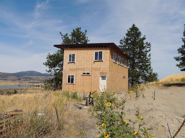 exterior space featuring a mountain view