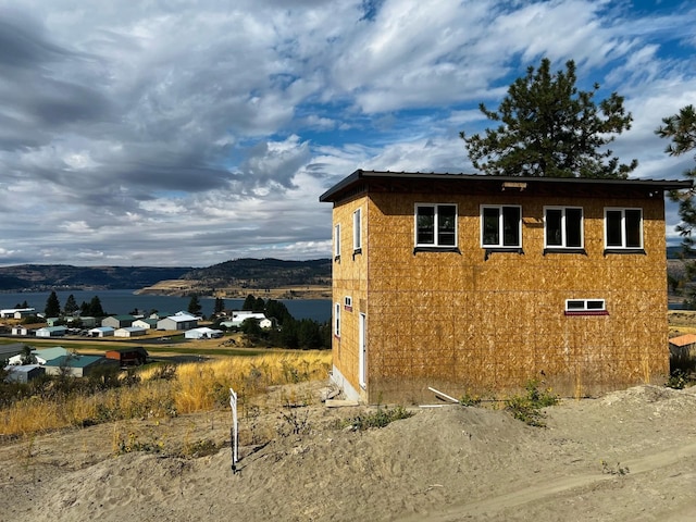 view of home's exterior featuring a mountain view