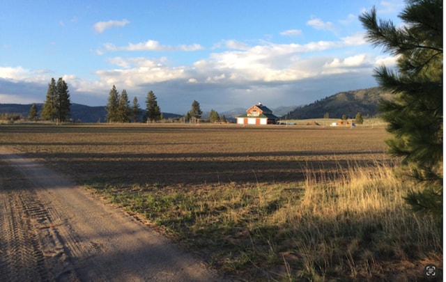 view of road with a mountain view and a rural view