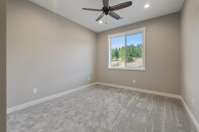 unfurnished room featuring carpet and ceiling fan