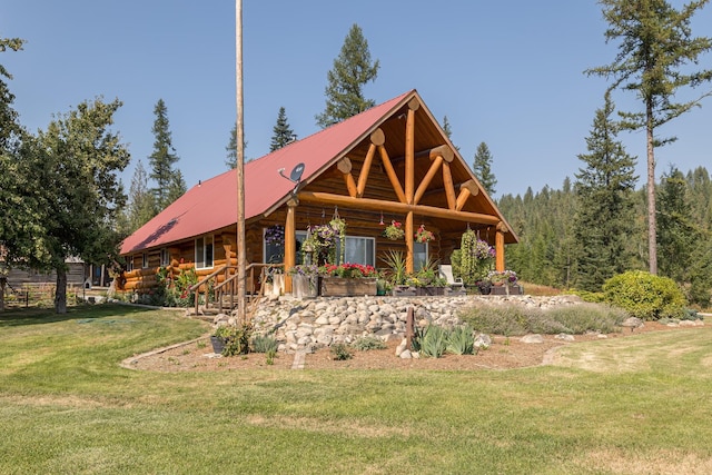 1114 Stohr Rd, Newport, WA 99156 - exterior space featuring log siding, a front yard, and metal roof