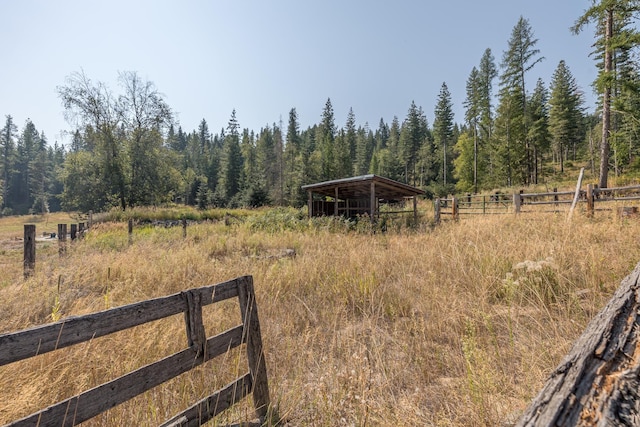 1114 Stohr Rd, Newport, WA 99156 - view of yard featuring a rural view, a forest view, and fence