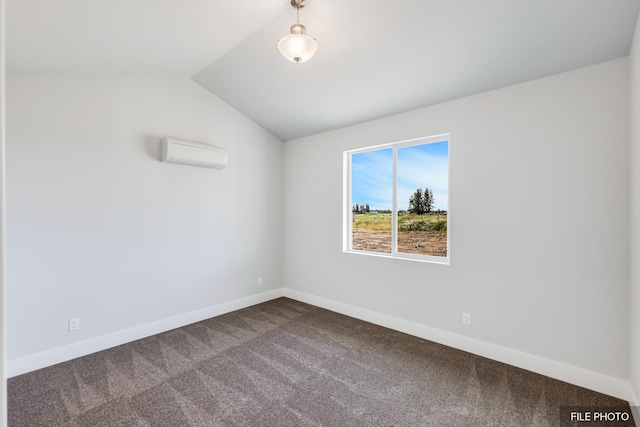 5871 S Sherri Lea Rd, Spokane, WA 99224 - unfurnished room with baseboards, an AC wall unit, dark carpet, and vaulted ceiling