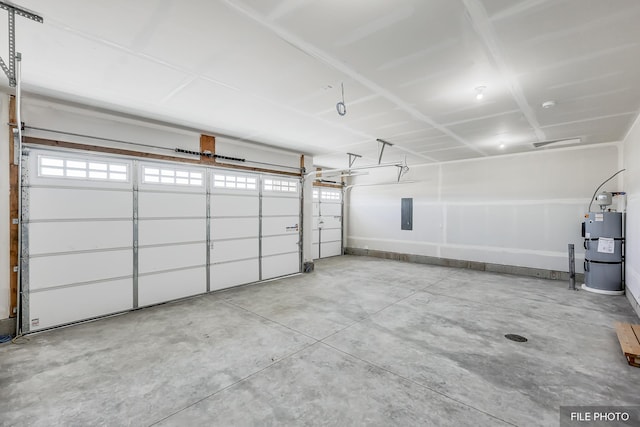 5871 S Sherri Lea Rd, Spokane, WA 99224 - garage featuring gas water heater and electric panel