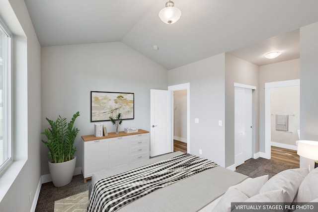 5871 S Sherri Lea Rd, Spokane, WA 99224 - bedroom featuring vaulted ceiling, baseboards, and a closet