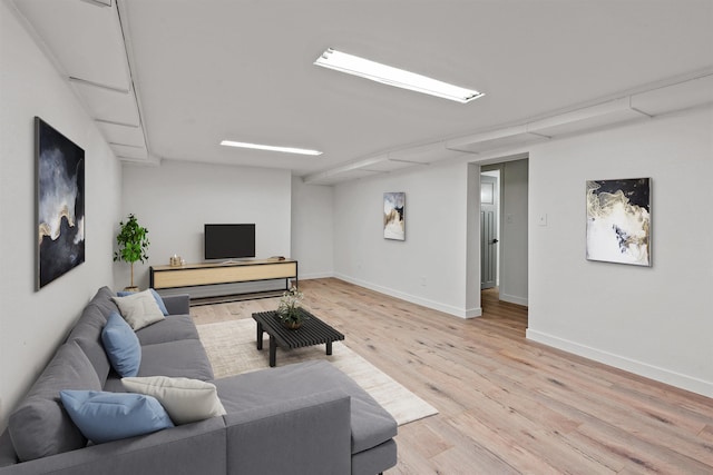 living room with light hardwood / wood-style floors