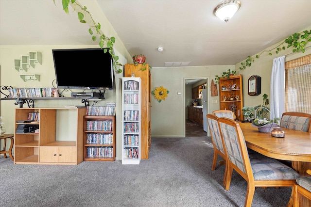 view of carpeted dining area