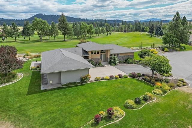 birds eye view of property featuring a mountain view