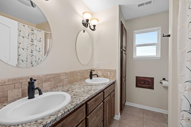 bathroom with vanity and tile patterned floors