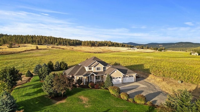 bird's eye view with a mountain view and a rural view