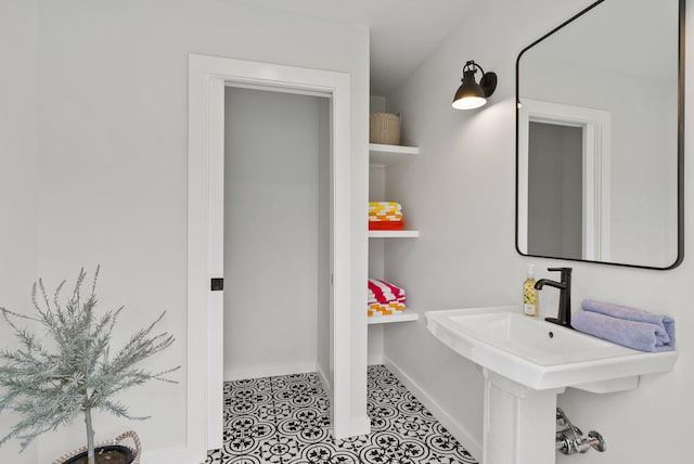 bathroom with tile patterned floors