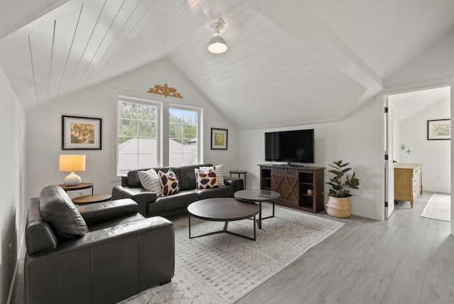 living room featuring vaulted ceiling, wooden ceiling, and light hardwood / wood-style floors