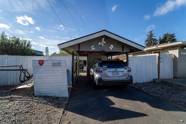 garage featuring a carport