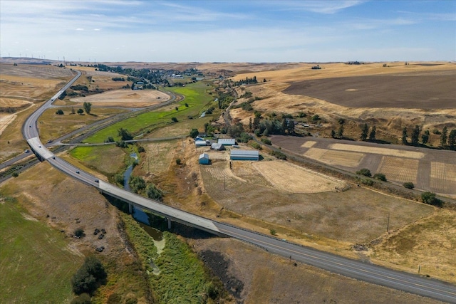 birds eye view of property featuring a rural view