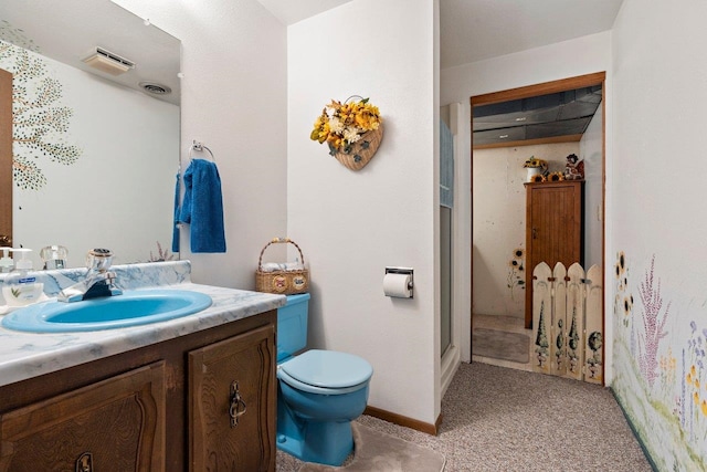 bathroom featuring a walk in shower, vanity, visible vents, and toilet