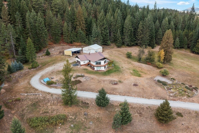 aerial view featuring a view of trees