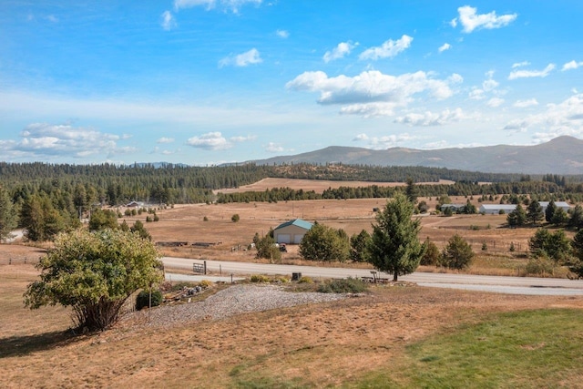 view of mountain feature with a rural view