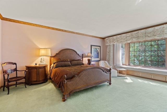 carpeted bedroom with crown molding