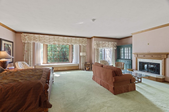 carpeted living room featuring a fireplace and crown molding