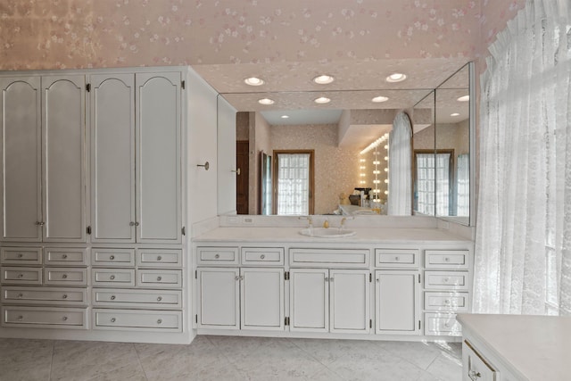 3206 W Long Prairie Rd, Valley, WA 99181 - bathroom with vanity, wallpapered walls, and tile patterned floors