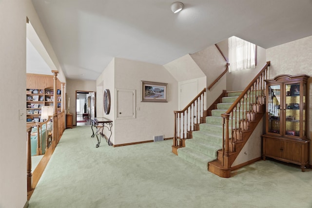 3206 W Long Prairie Rd, Valley, WA 99181 - staircase featuring carpet, baseboards, and vaulted ceiling