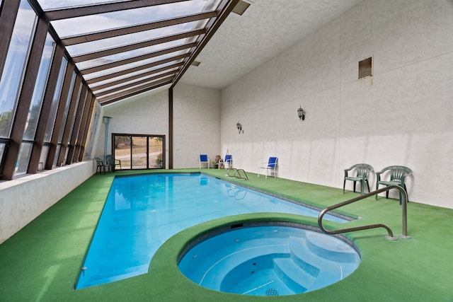 view of pool with an indoor in ground hot tub